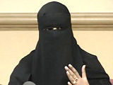 Teaching assistant wearing a black veil
